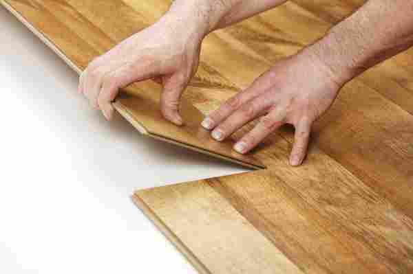 Hardwood Floor vs. Laminate: Which Flooring Gives the Biggest Bang for Your Buck?